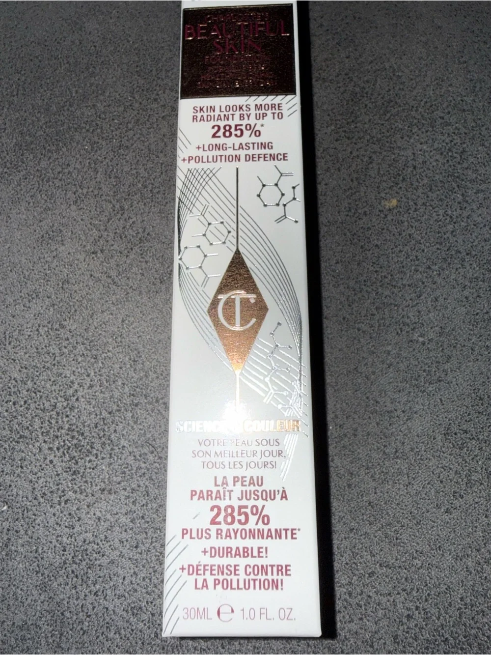 Charlotte Tilbury Neutral Shade 8 Packaging - White and Tan